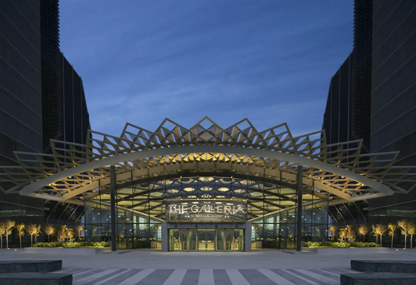 The Galleria Al Maryah Island illuminated entrance canopy beside the Four Seasons Abu Dhabi