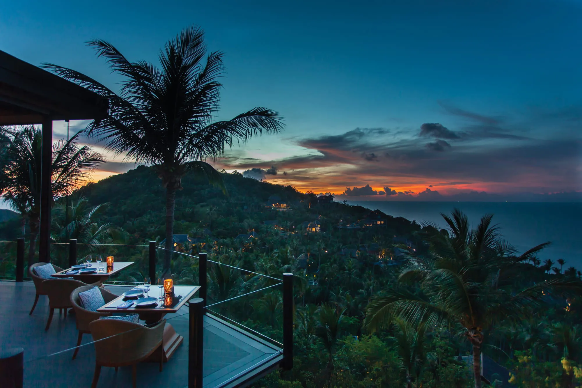 Four Seasons Resort Koh Samui ocean-view lawn set for a wedding reception dinner above Laem Yai Bay