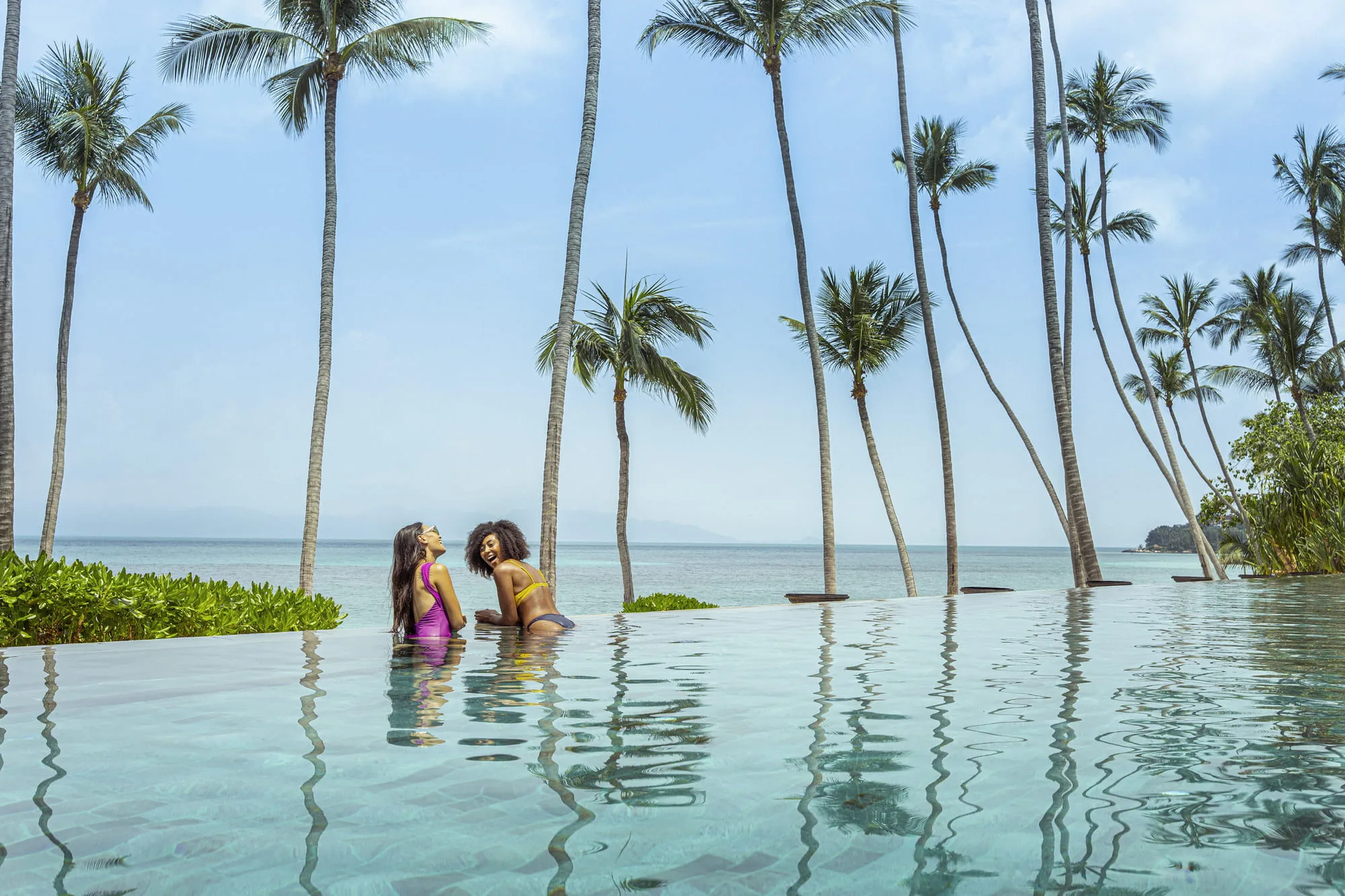 Four Seasons Resort Koh Samui evening wedding reception celebration on the ocean-view lawn above the Gulf of Thailand