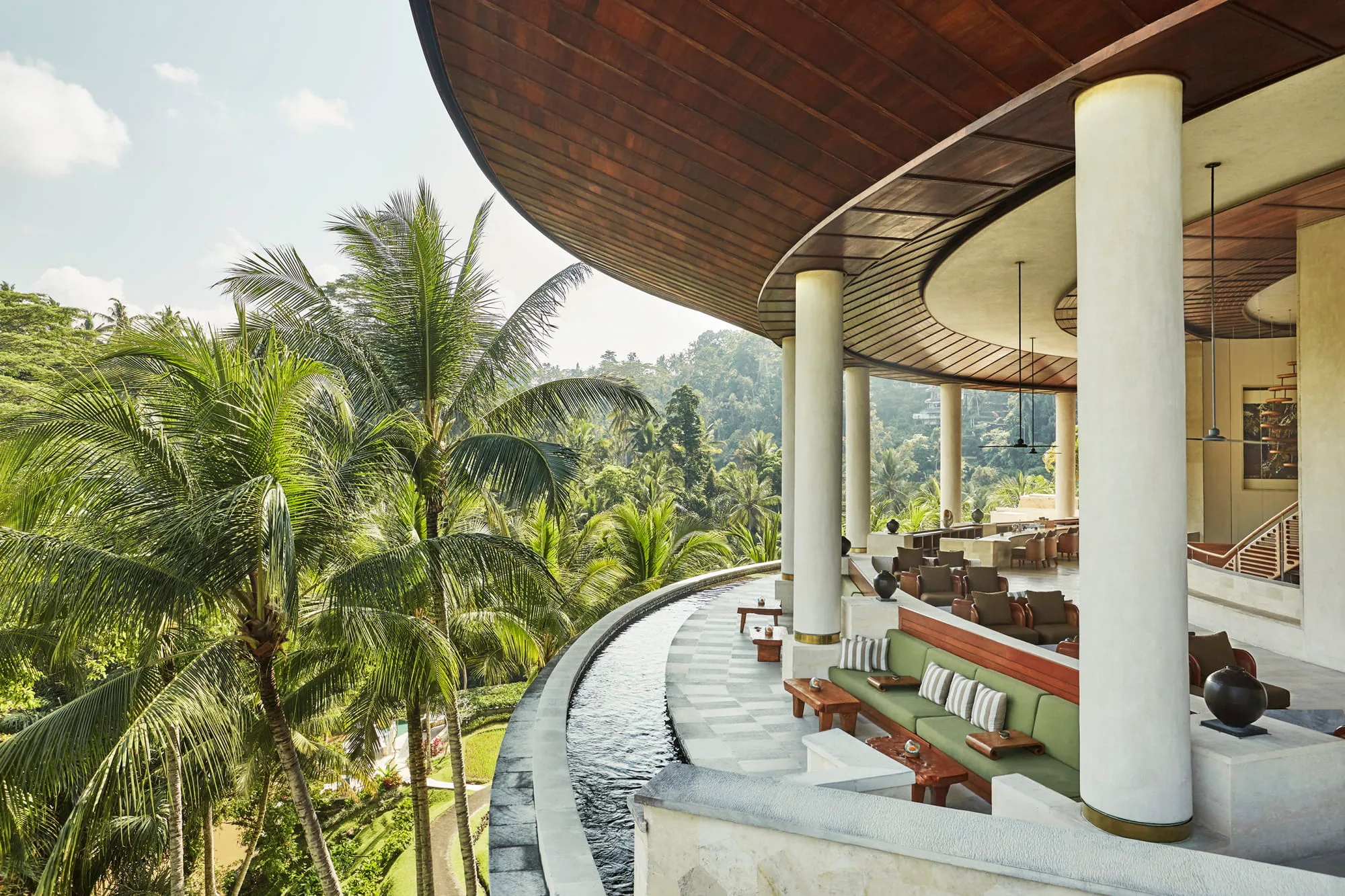 Open-air riverside lawn setting beside the Ayung River at Four Seasons Resort Bali at Sayan Ubud Bali