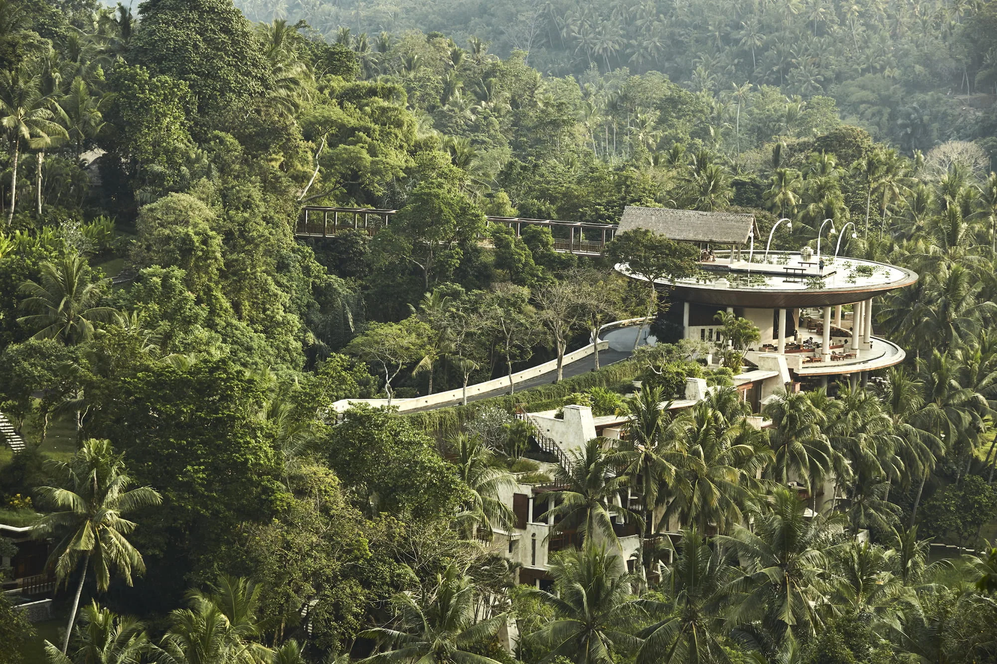 Poolside reception dinner setup beside the Ayung River at Four Seasons Resort Bali at Sayan Ubud Bali