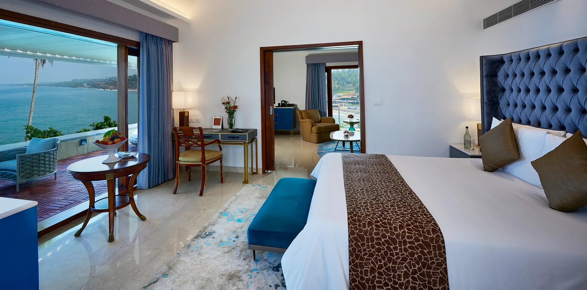 Ocean View Suite bedroom at The Leela Kovalam