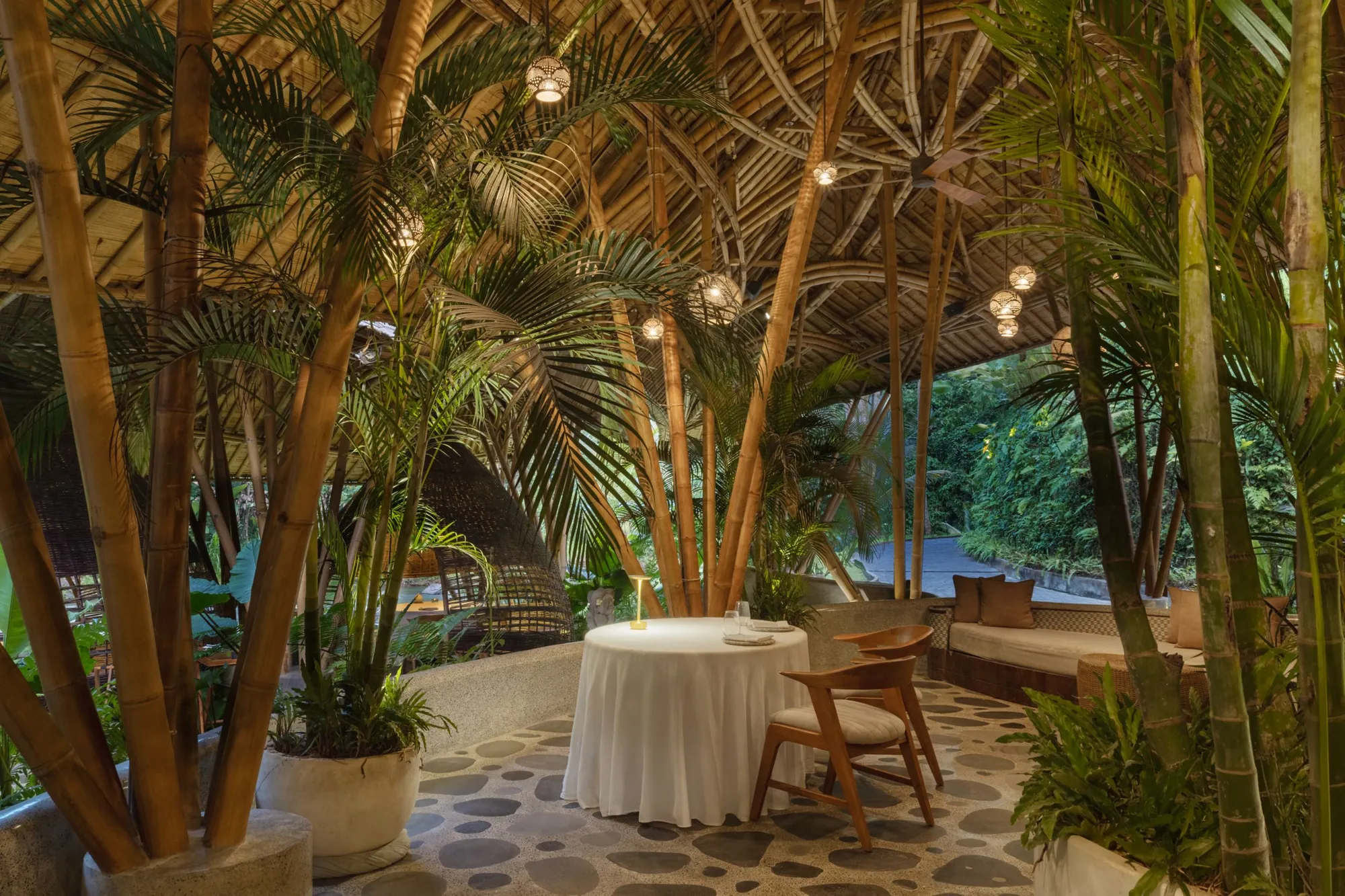 Kubu restaurant bamboo dome pavilion beside the Ayung River at Mandapa Ubud Bali