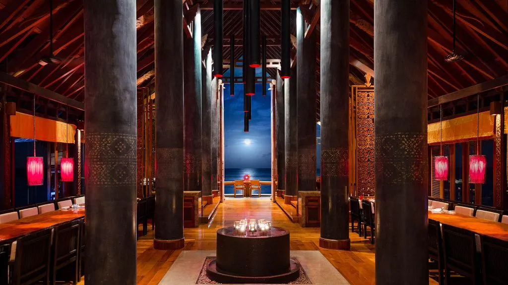 Reethi Fire beachside restaurant dining setting at One&Only Reethi Rah, Maldives