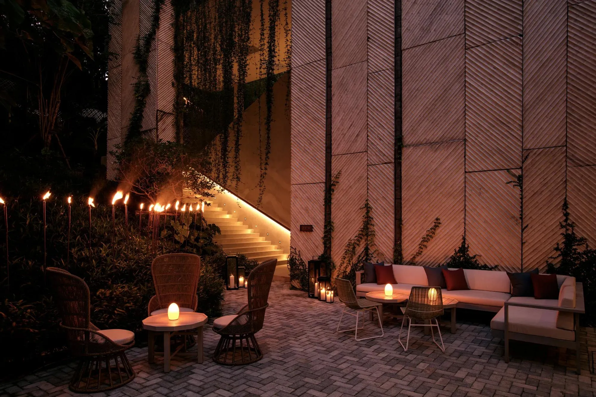 Garden and Beach Lawn outdoor event setting above the private beach at Rosewood Phuket, Phuket Thailand