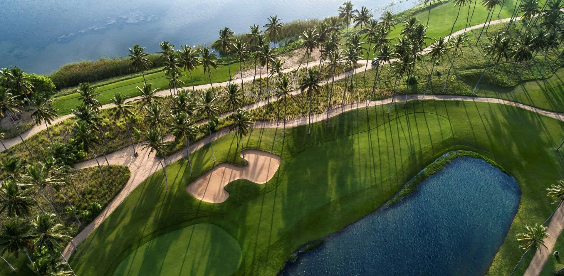 Golf course landscape overlooking the Indian Ocean at Shangri-La Hambantota, Sri Lanka