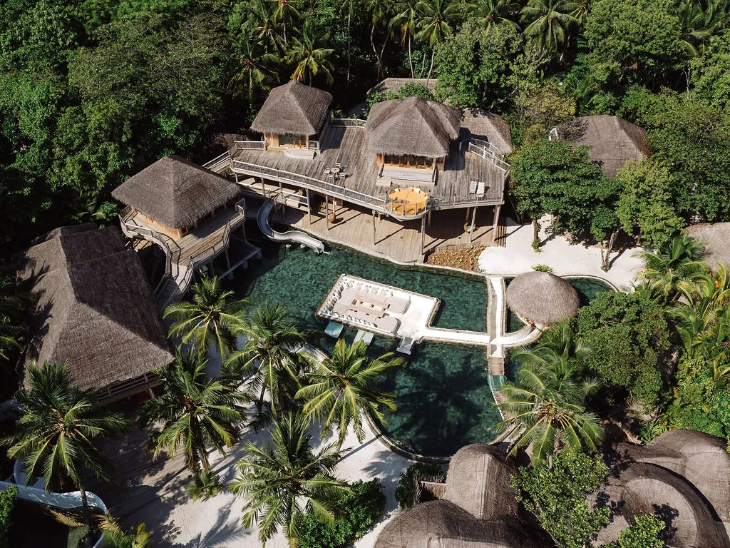 Nine-bedroom private reserve villa exterior at Soneva Fushi Maldives