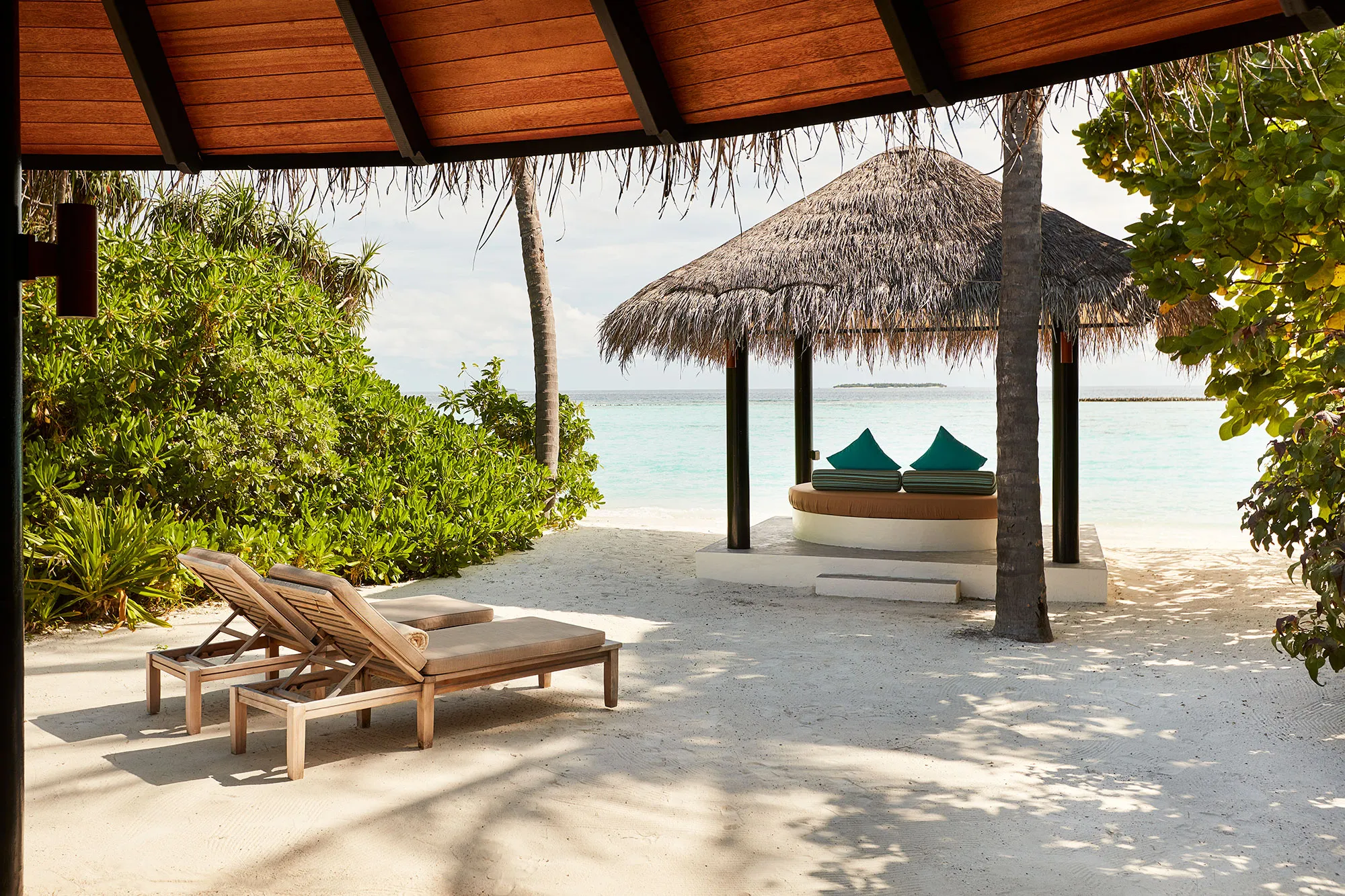 Deluxe beach villa with direct sand access at Sun Siyam Iru Fushi, Maldives