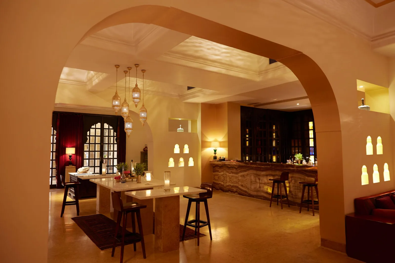 Walled sandstone courtyard set for a banquet dinner at Suryagarh Jaisalmer
