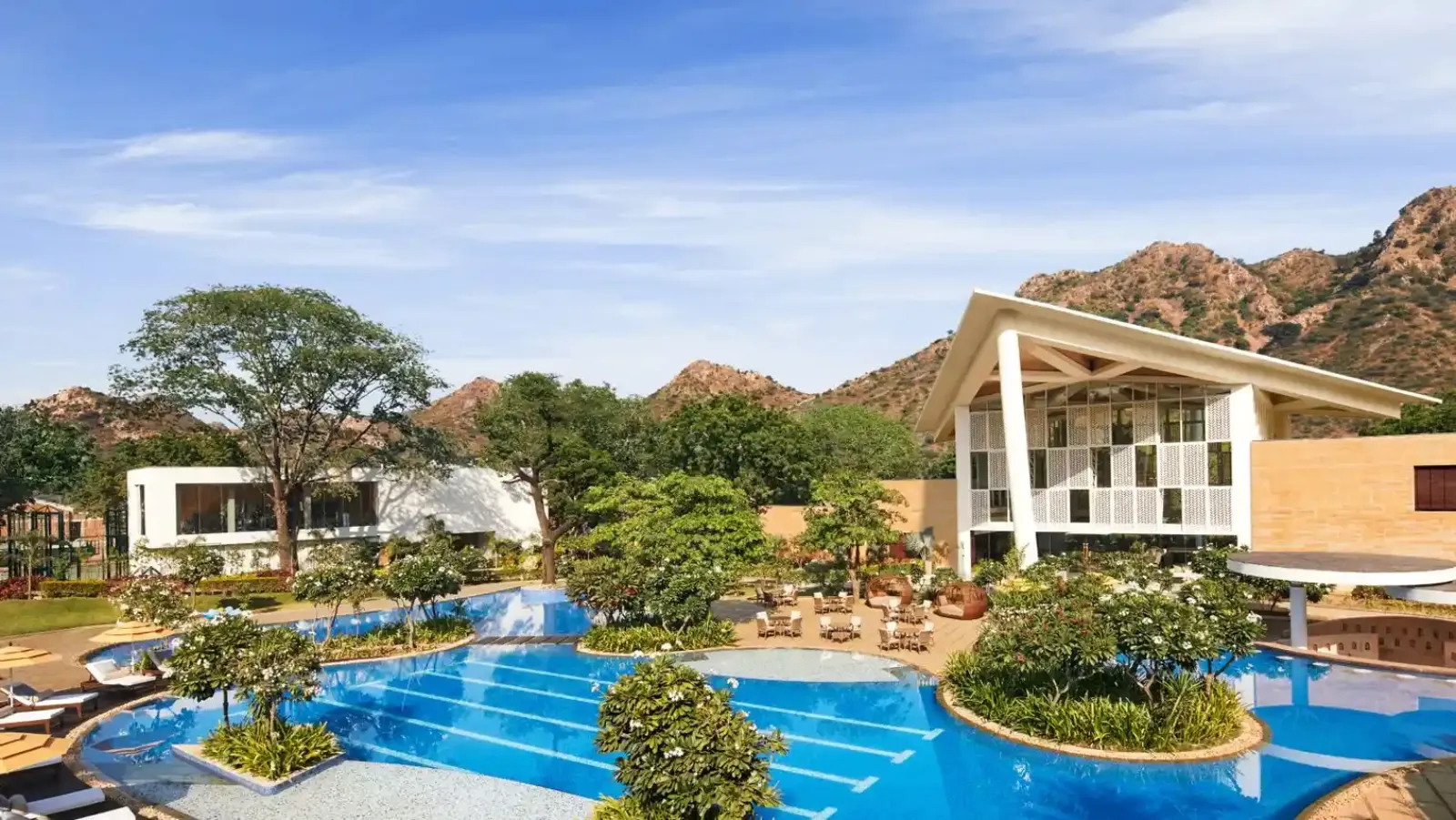 Swimming pool and hill terrace at Taj Aravali Resort and Spa Udaipur