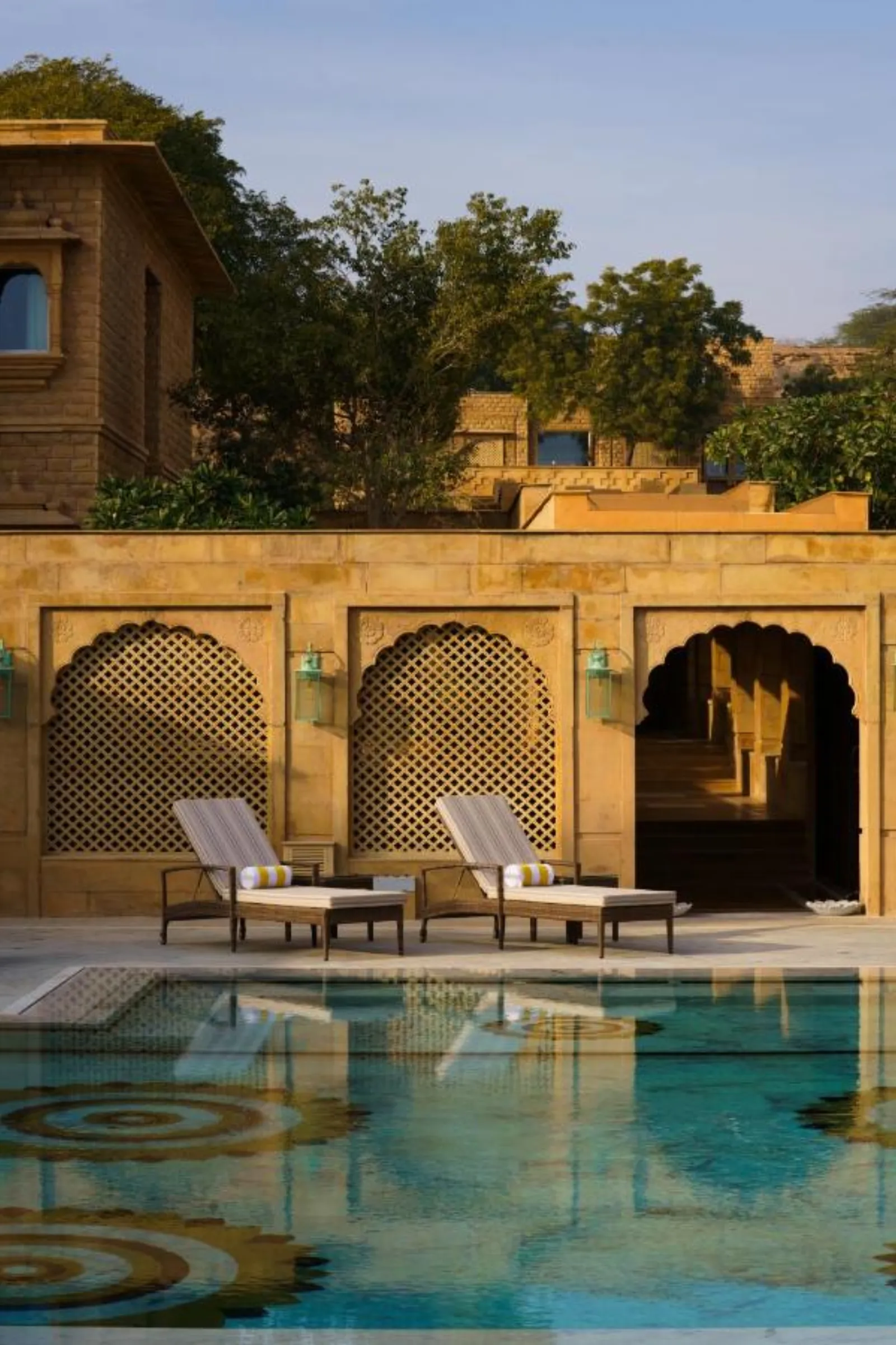 Carved golden-sandstone jali and Marwari architectural detail at Taj Gorbandh Palace, Jaisalmer