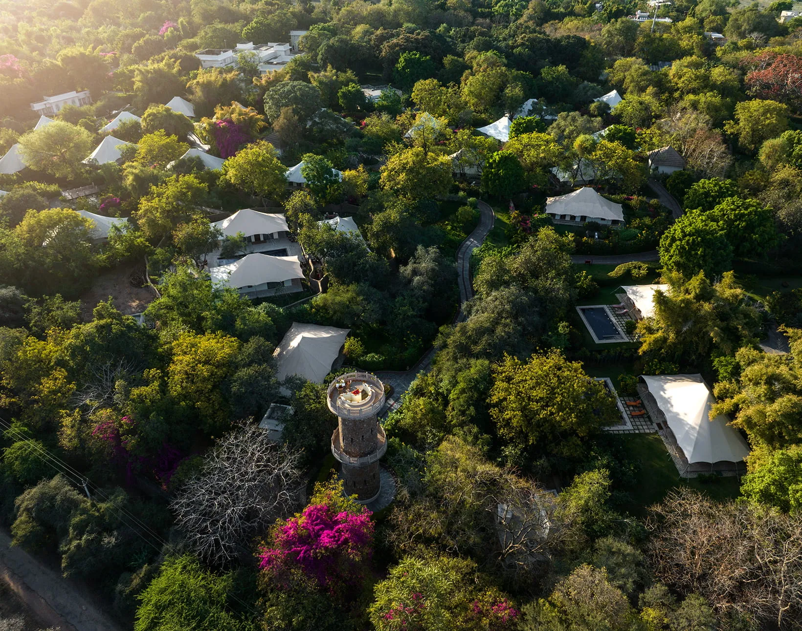 Aerial view of The Oberoi Vanyavilas Wildlife Resort with luxury tents set among mango orchards and forest on the edge of Ranthambore National Park