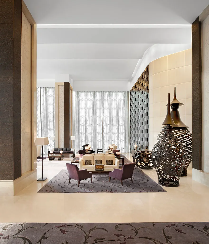Elegant lounge interior at The St. Regis Bangkok with residential-style furnishings